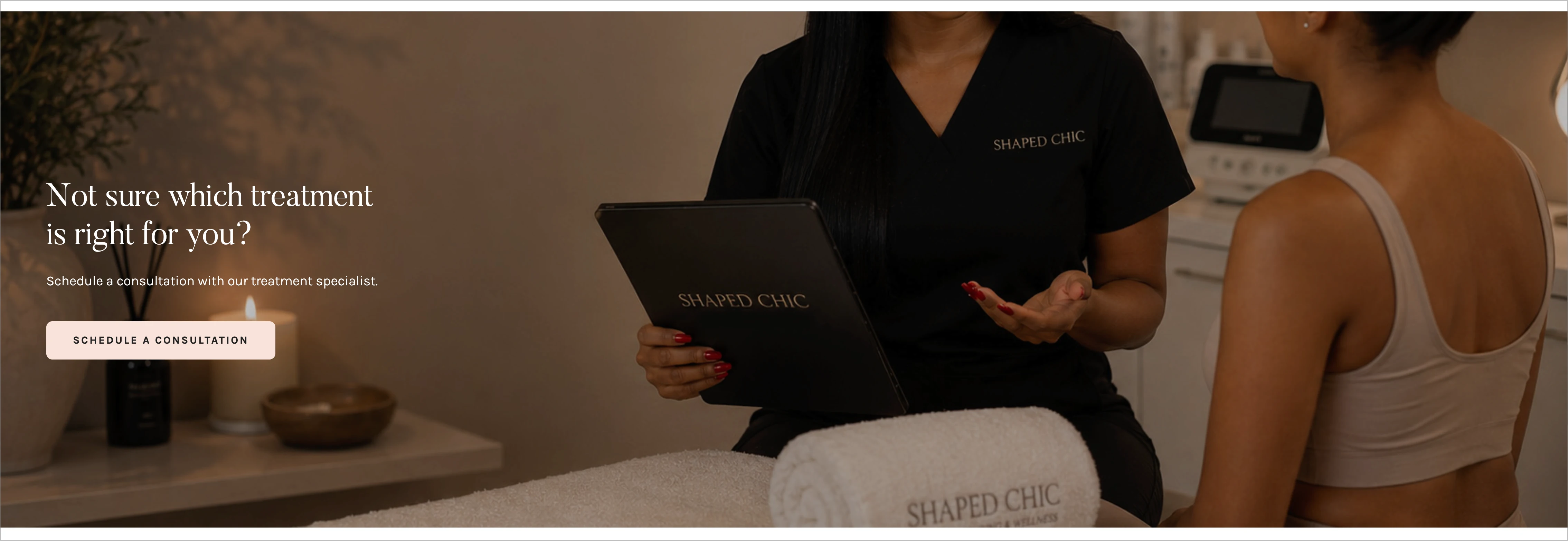 A ShapedChic practitioner discussing a treatment plan with a client.